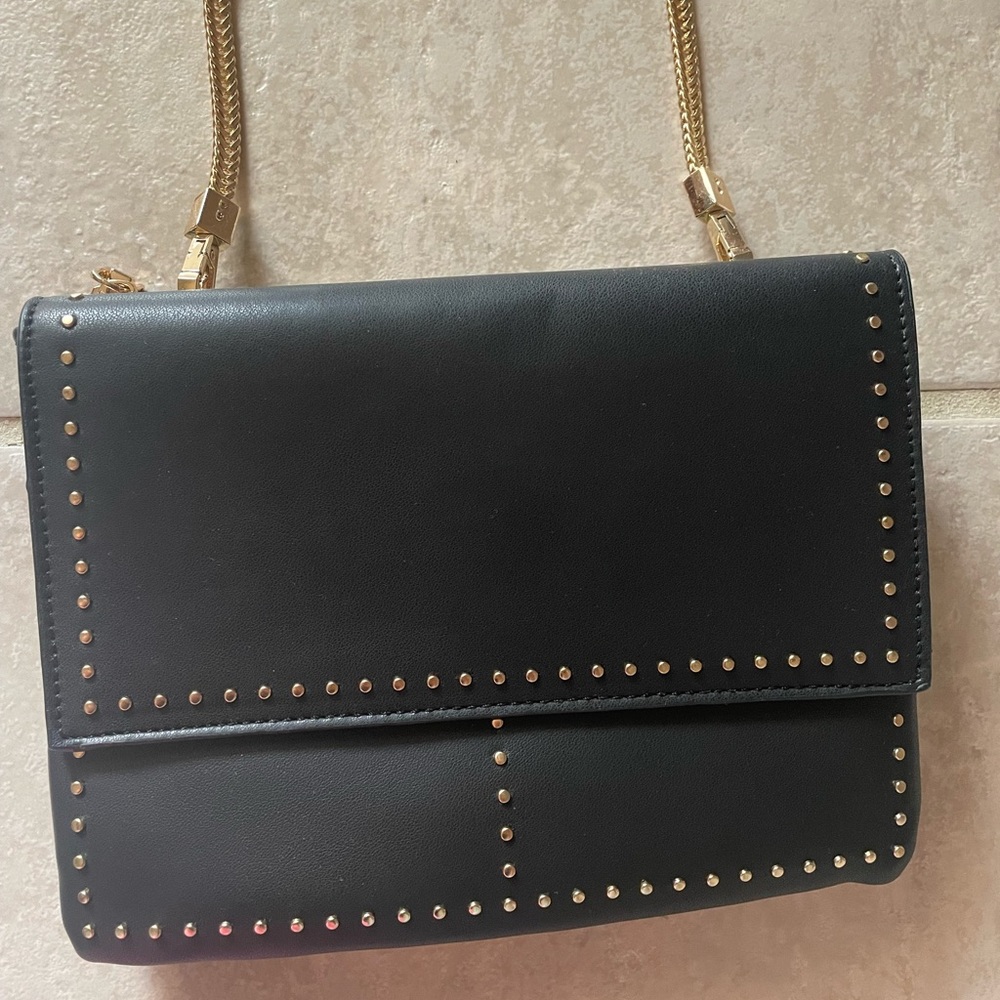 NWOT black crossbody bag - stuffing still in bag as seen in pics
